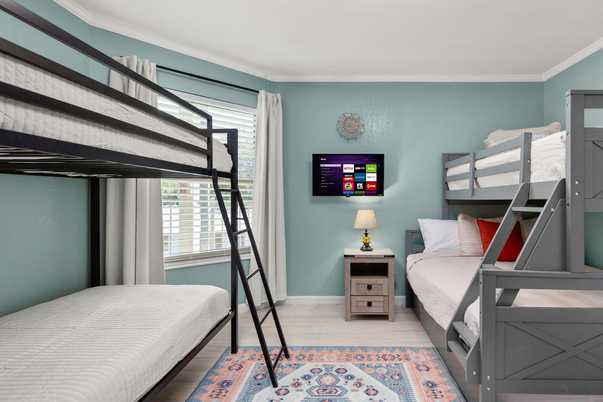 Guest bedroom with multiple sleeping configurations.