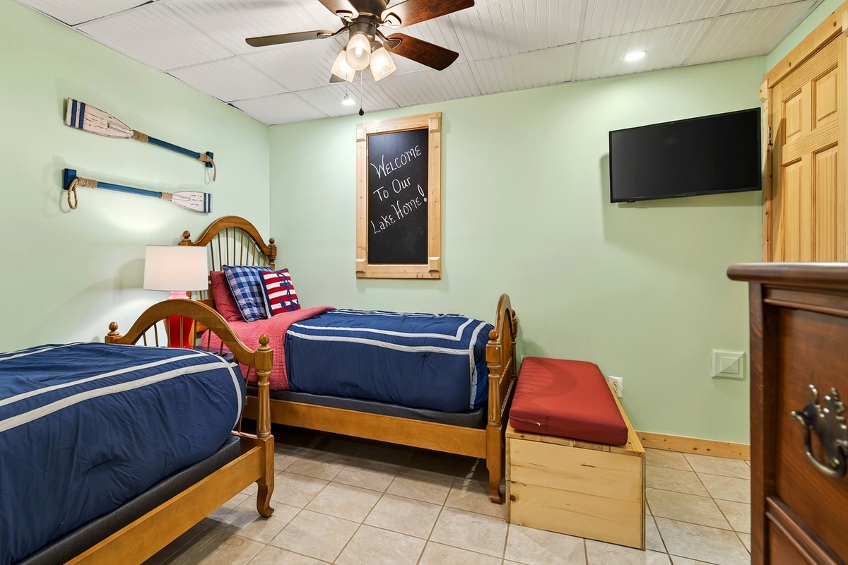 The twin bedroom has a TV