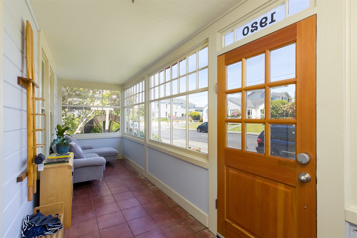 Sunporch with games, puzzles, and cozy seating