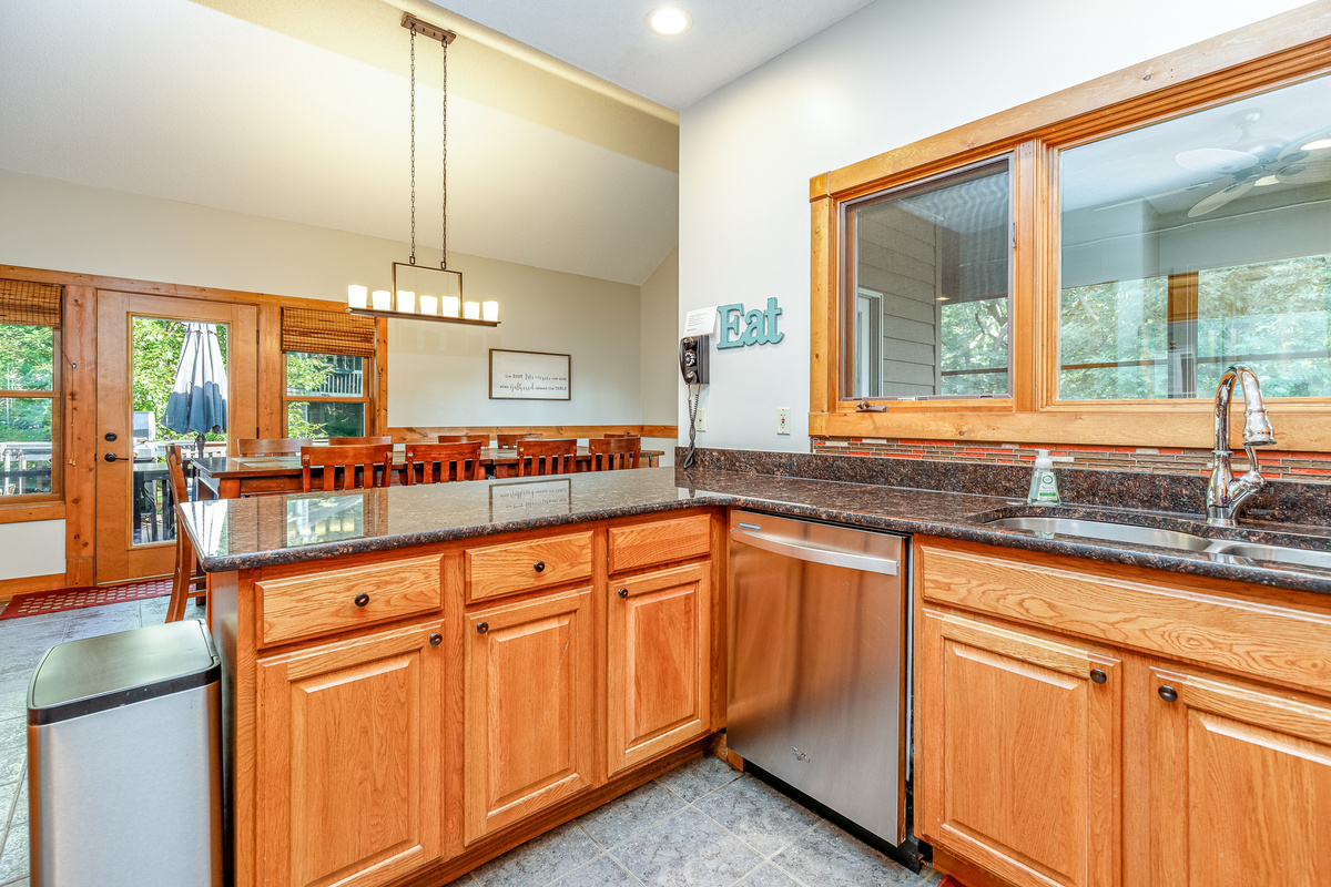Fully stocked kitchen with large dining room adjacent