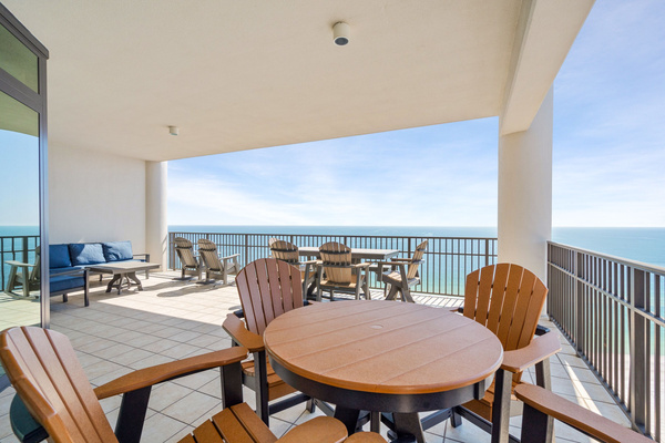 A variety of comfortable seating on a 700 sq. ft. balcony with priceless view!