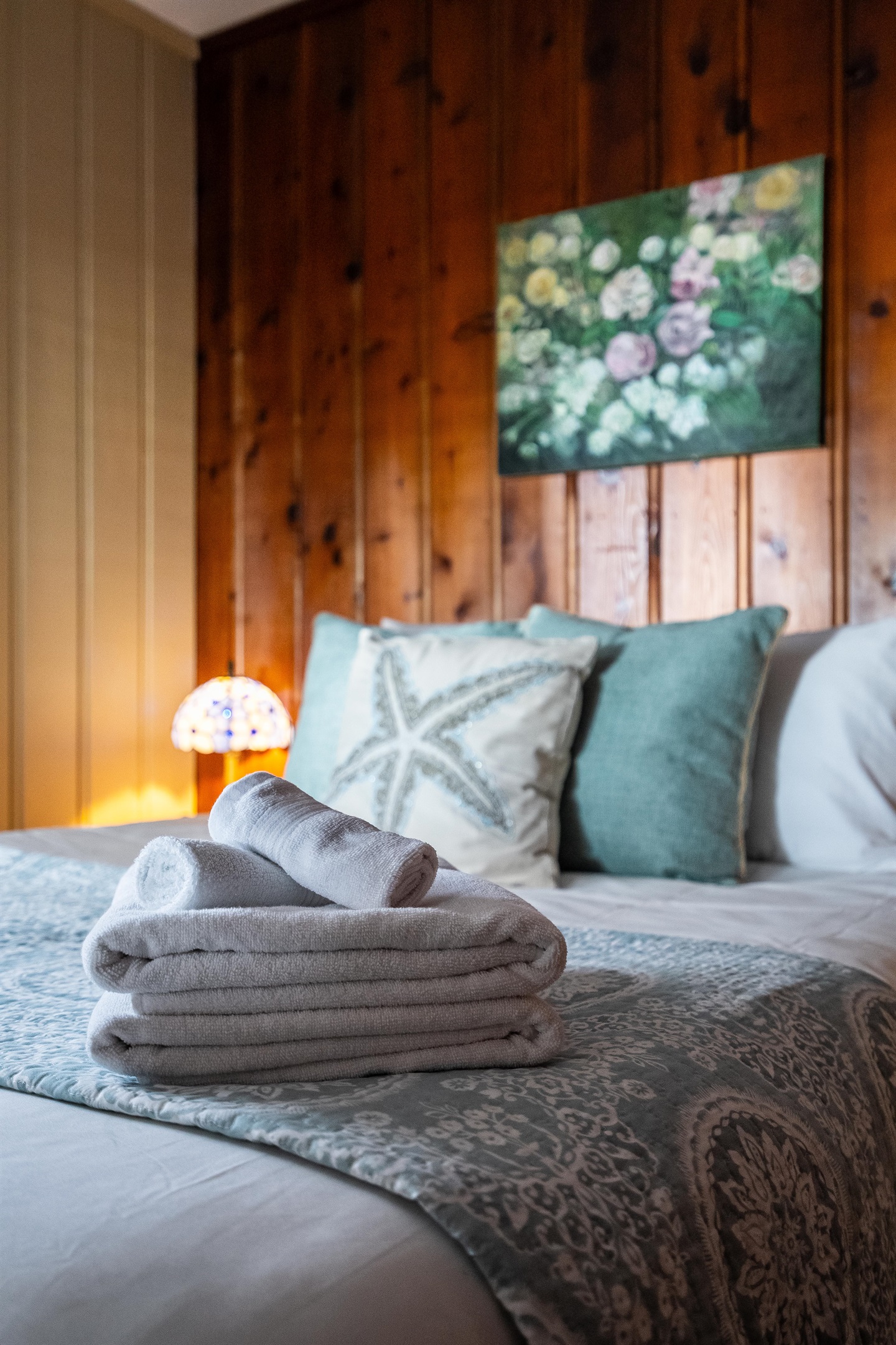 Rustic queen bedroom charm balanced with modern details.