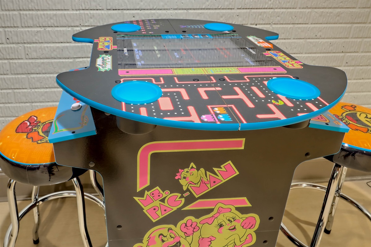 Sit-down arcade table perfect for friendly competitions.