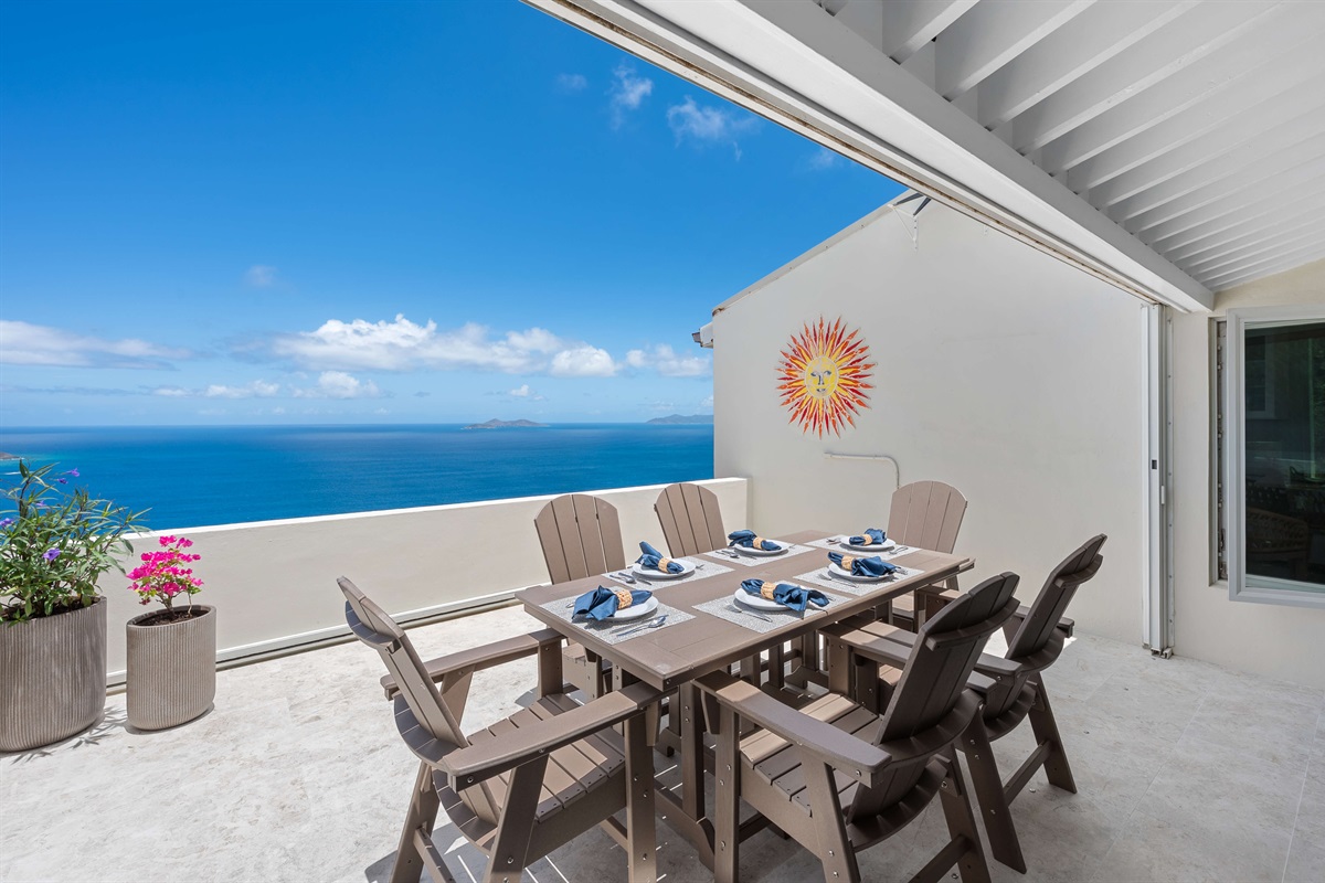 Large balcony with outdoor dining and incredible views