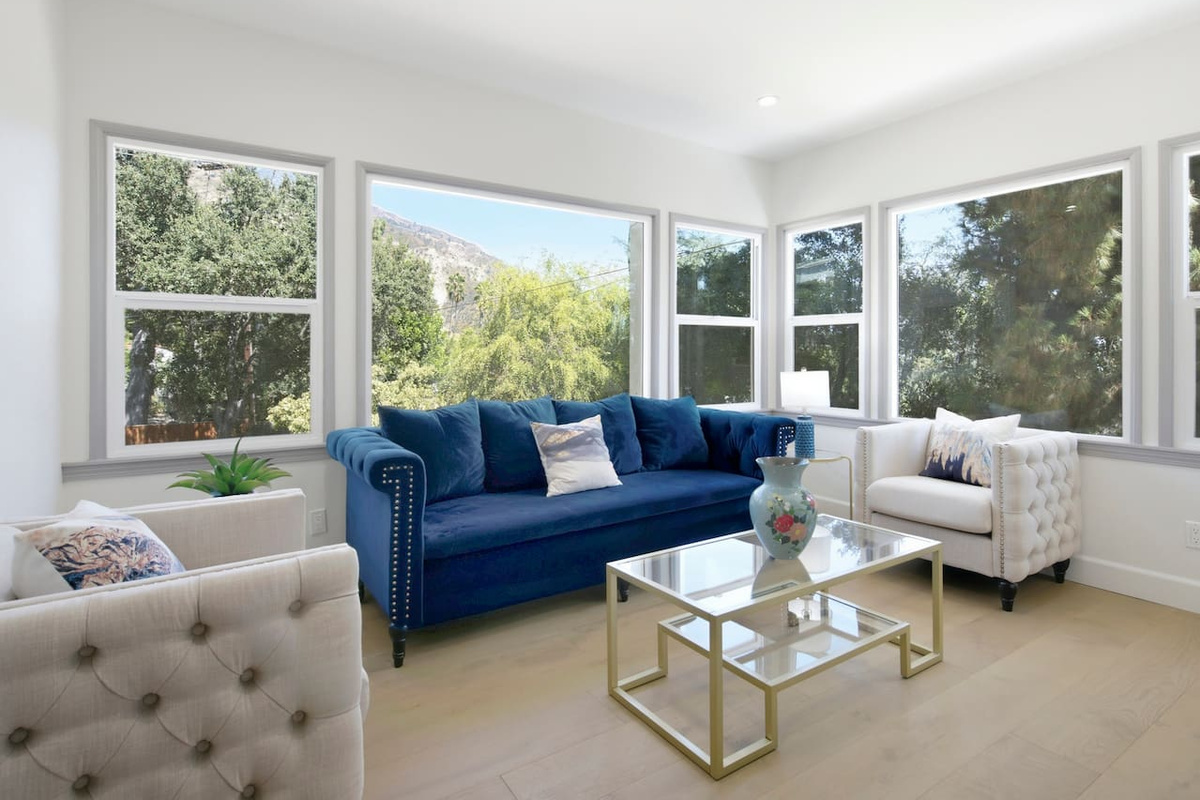 Sink into the comfortable seating and enjoy the welcoming ambiance of this beautifully crafted house.