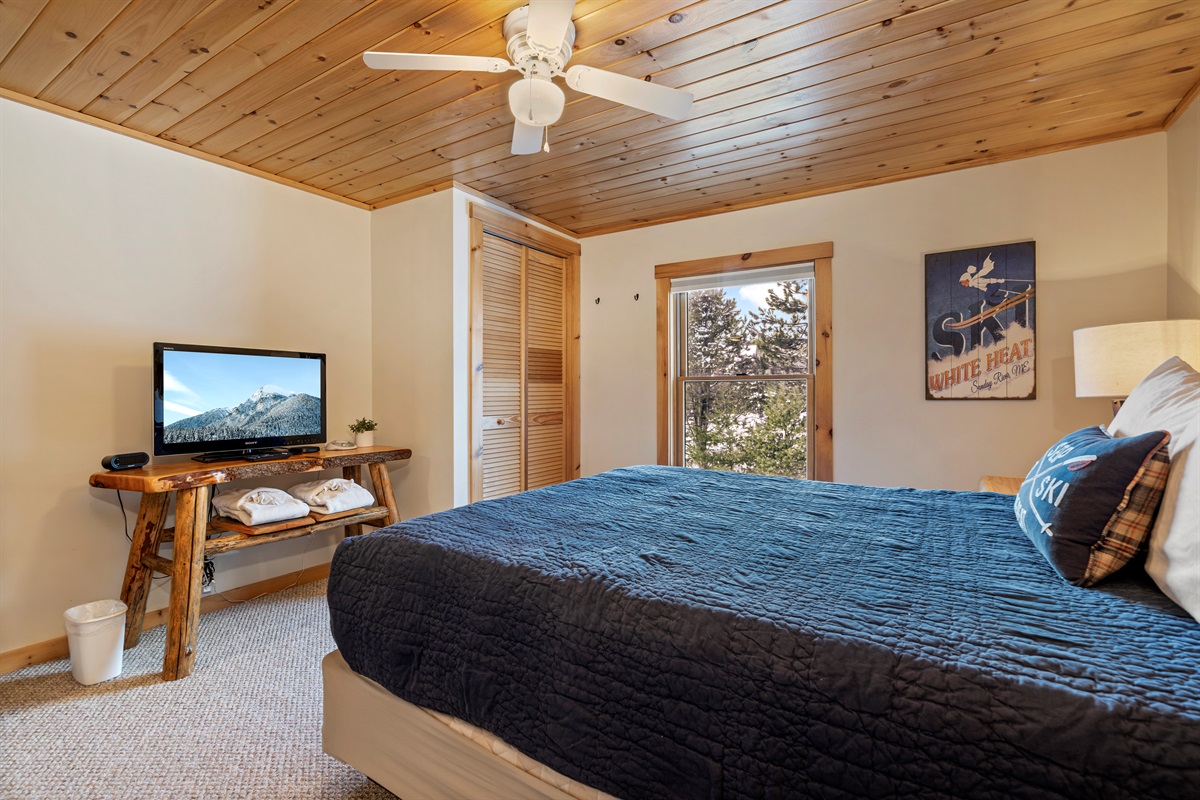 Welcome to our second-floor master bedroom, elegantly furnished with a queen-size bed!