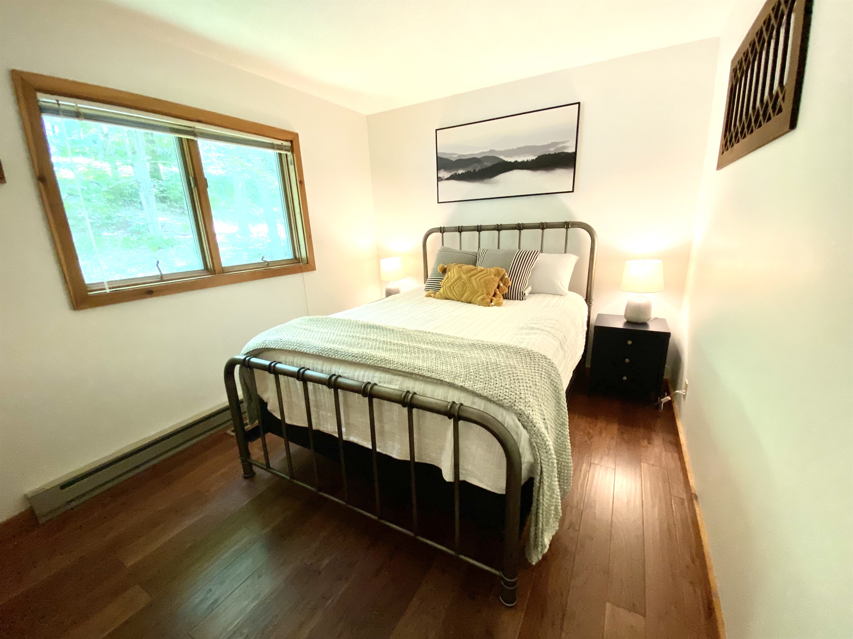 Queen Bed in Bedroom 3;  next to the bathroom.