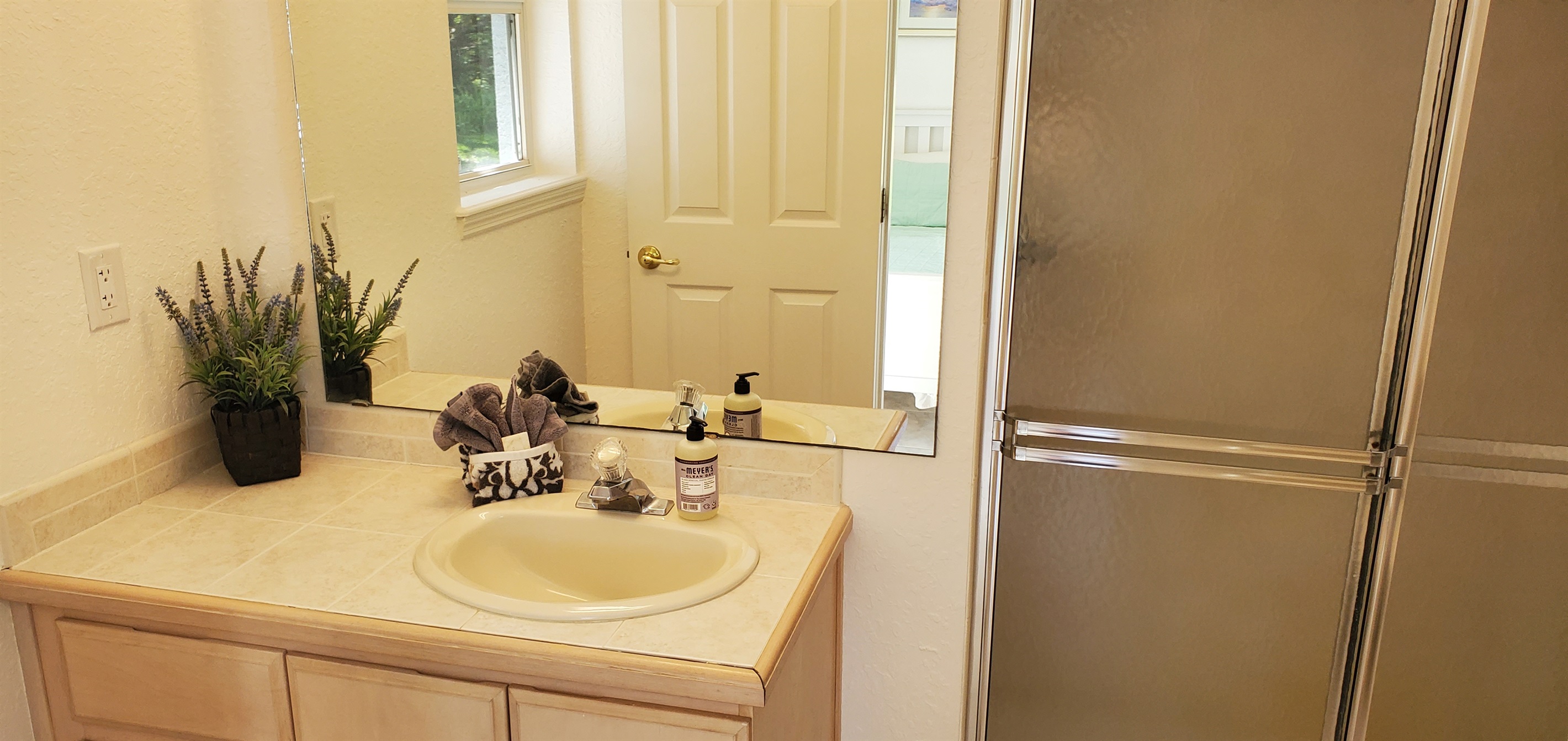 Twin private bathroom with walk in shower