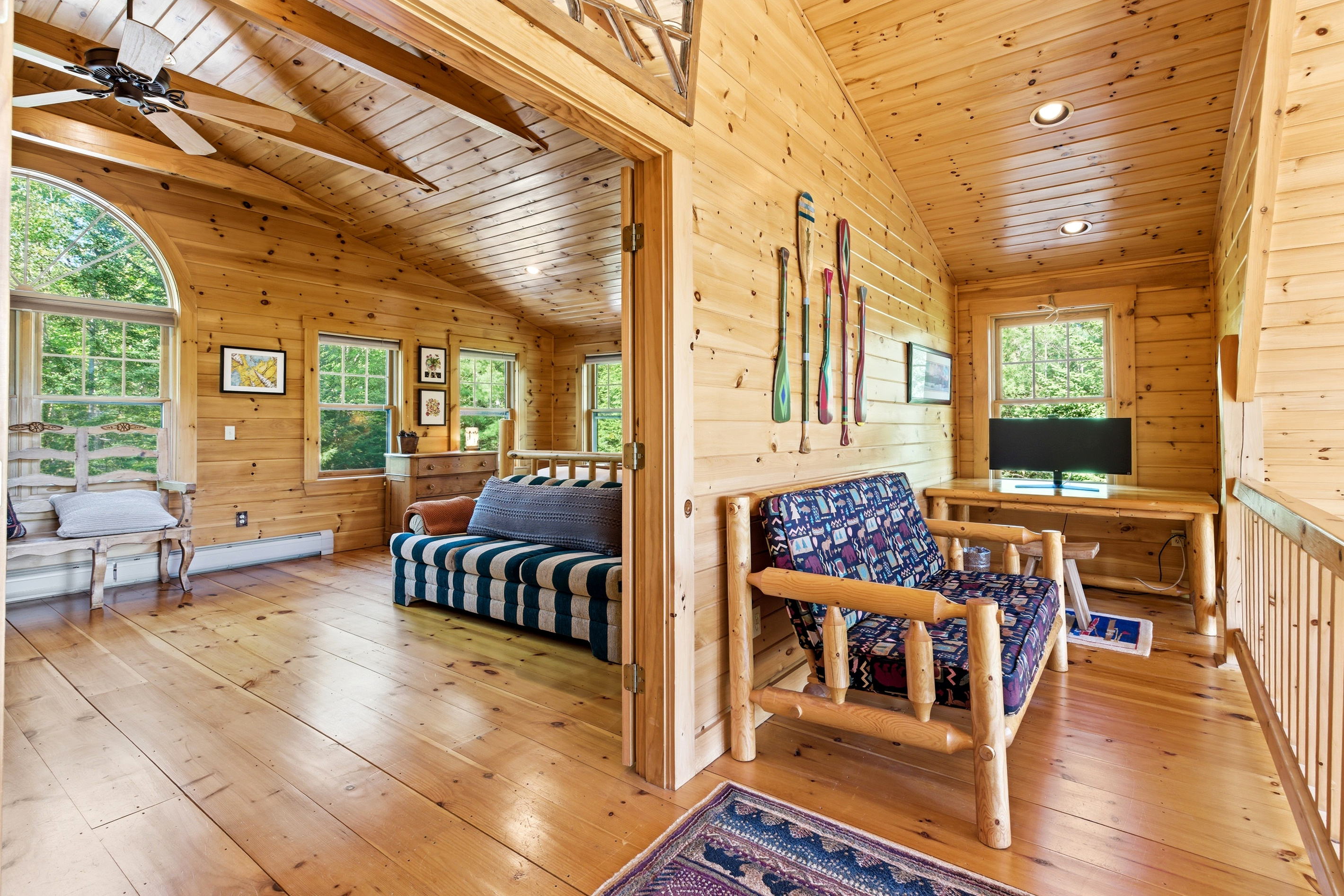 Curl up with a book or simply take in the views from this inviting loft retreat.