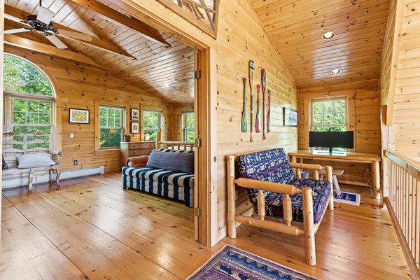Curl up with a book or simply take in the views from this inviting loft retreat.