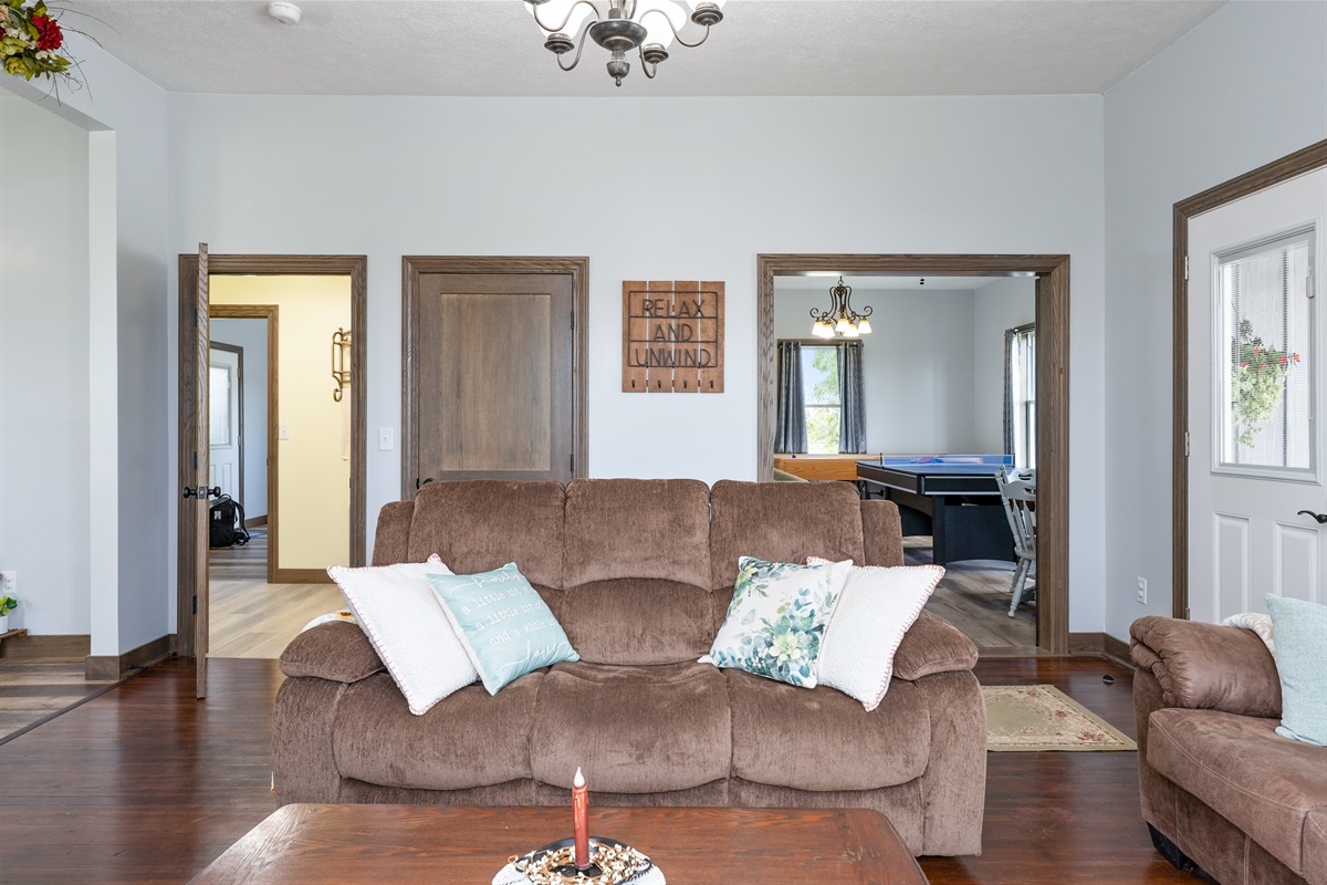 Comfortable lounge area with direct access to the game room—ideal for family fun and relaxation.
