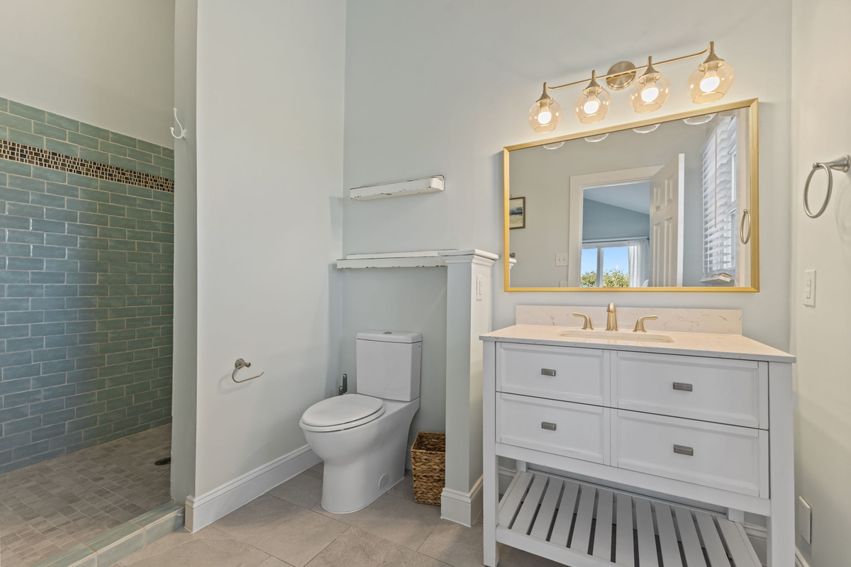 The ensuite master bathroom offers a double vanity and plenty of space to start and end your day in comfort