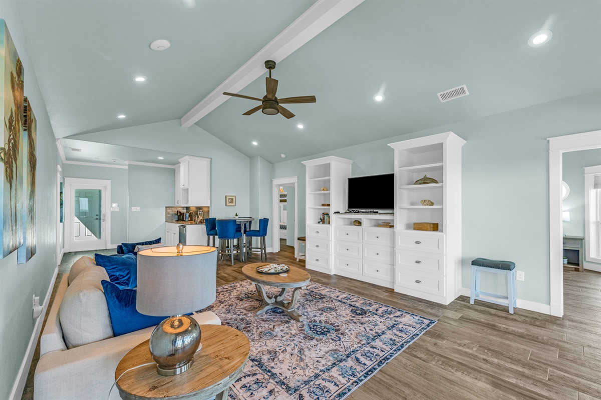 Crystal Paradise Media Room: Stylish media room with ample seating and versatile layout for family fun.