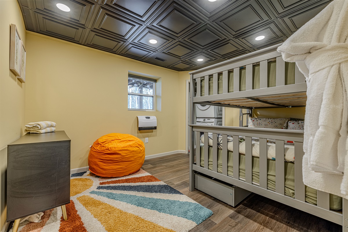 We love the bright walls and unique design. The cozy beanbag and large window add to the playful, comfortable atmosphere.