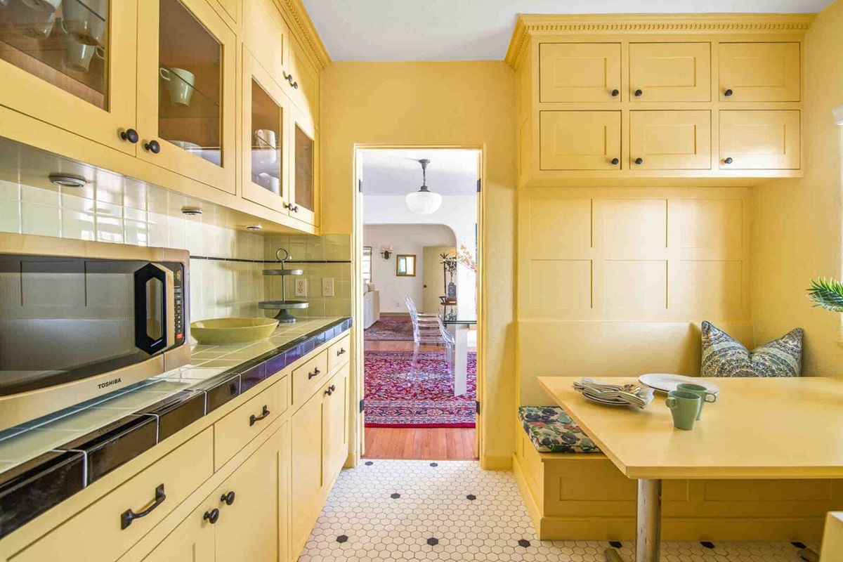 This kitchen was recently renovated with the original style of the house in mind. The cabinets are solid wood with soft-close drawers and plenty of storage. 