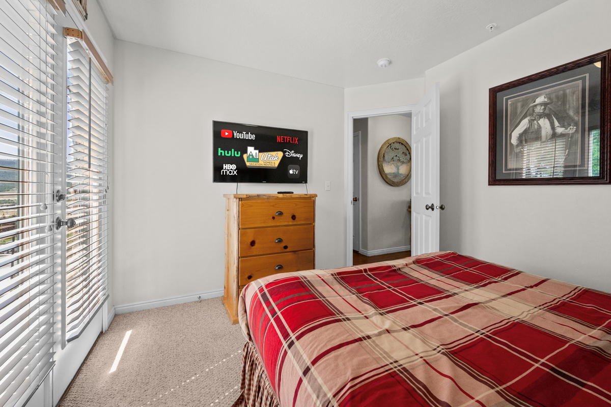 This room features a TV for relaxing after a long day of fun