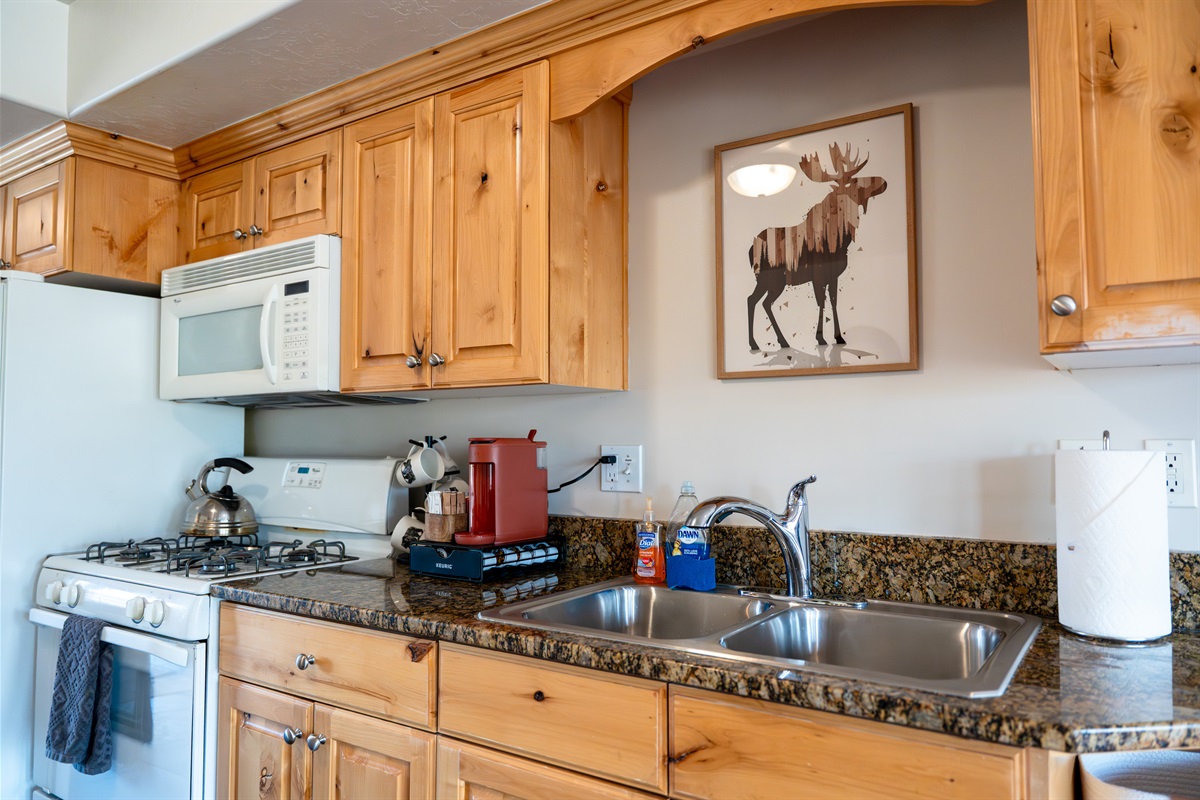 Granite countertops offer plenty of space to prep and gather.