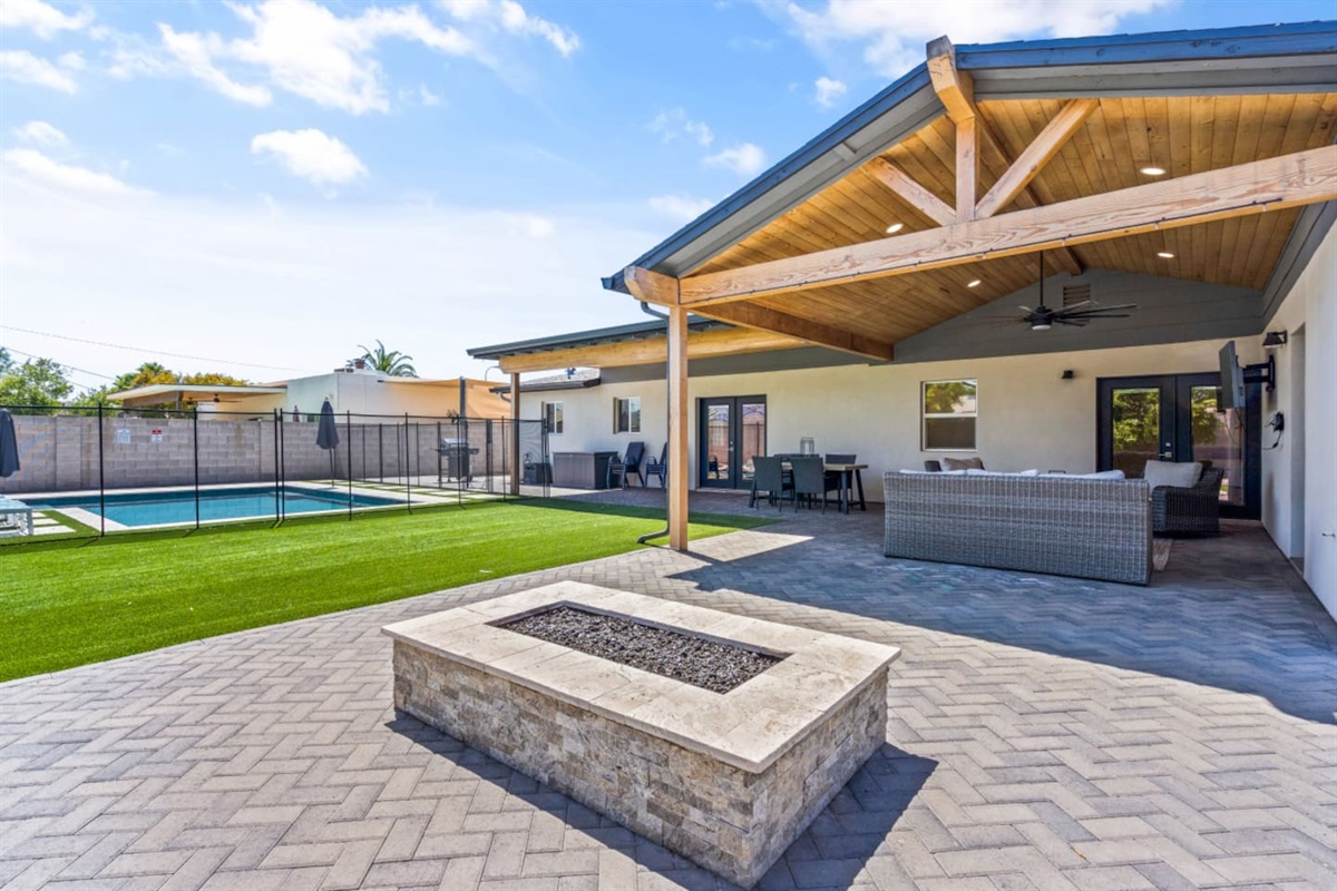 Backyard, fire-pit, lounge, pool, outdoor dining and tv