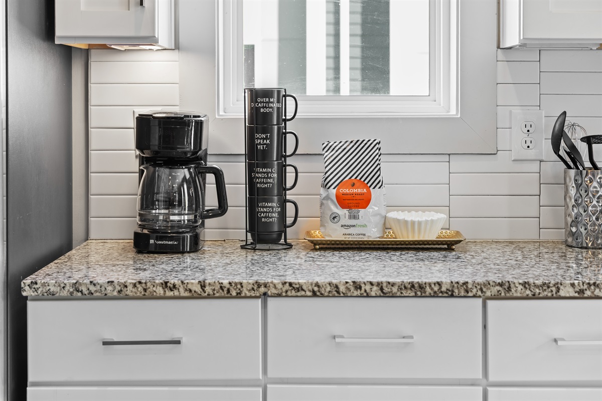 Coffee Bar: Brew your favorite coffee in style with modern appliances and charming decor!