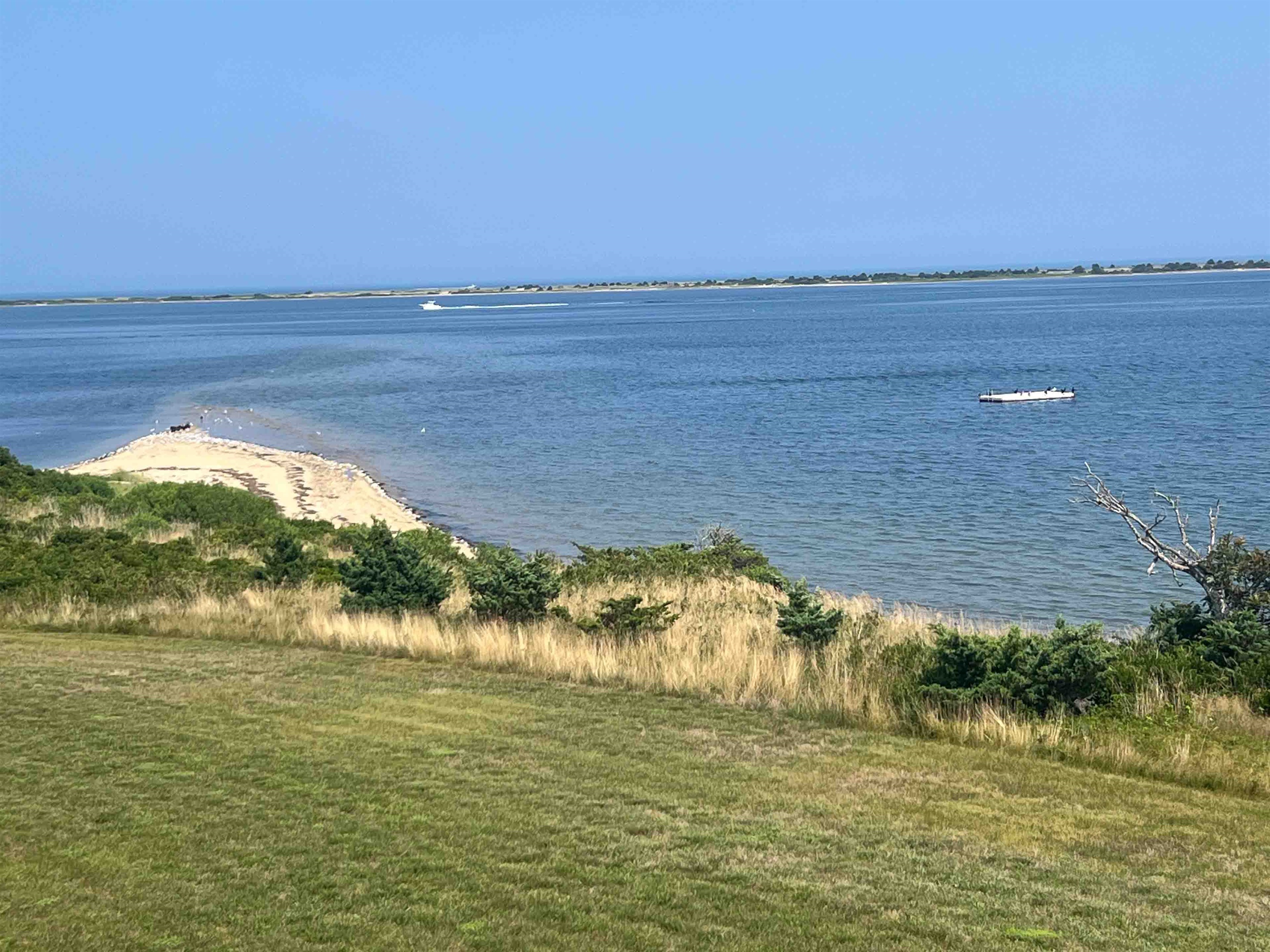 Views toward Cape Pogue, the sand spit and swimming platform