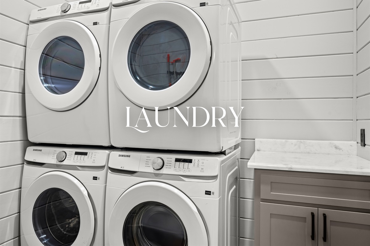 A full laundry setup with modern machines makes it simple to refresh your clothes and keep things easy during longer stays.