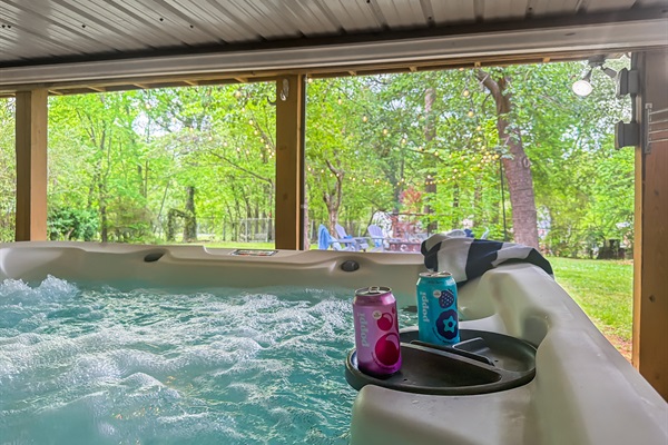 Sink into the hot tub with the trees closing in around you — Hot Springs Breakaway