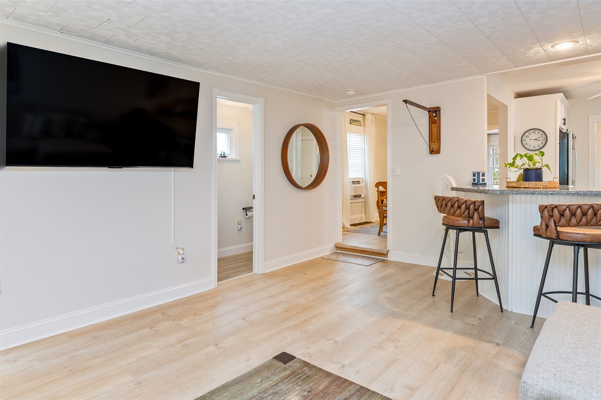 Thoughtful layout connects shared spaces with ease—enjoy easy flow from living to dining, with charming details at every turn.