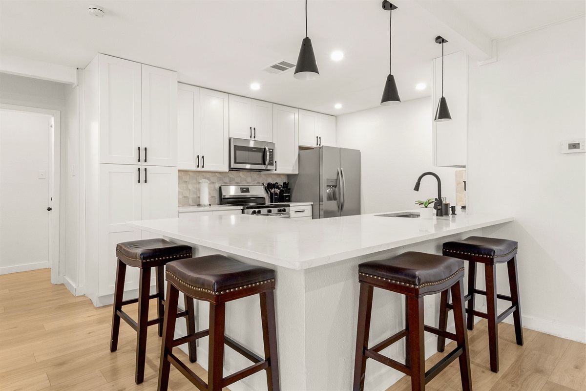 Spacious kitchen island with seating—perfect for coffee, meals, and conversation ✨
