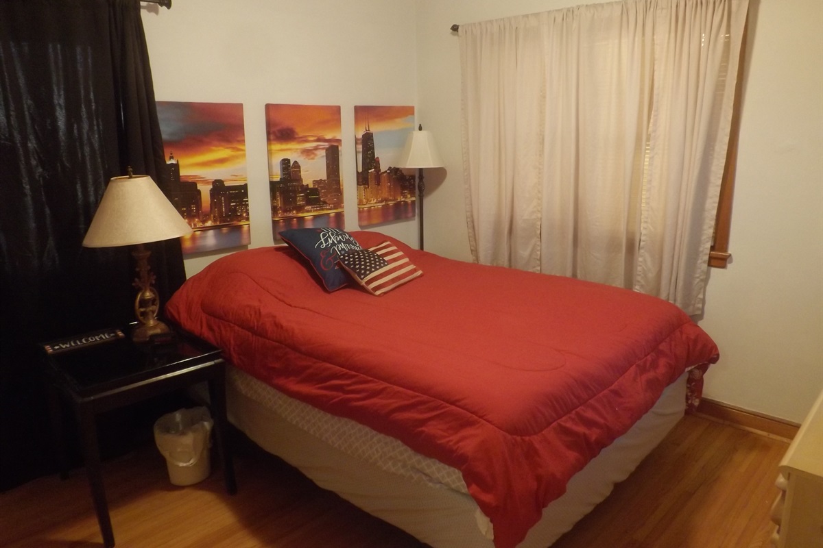 Queen bed with Roku Smart TV
