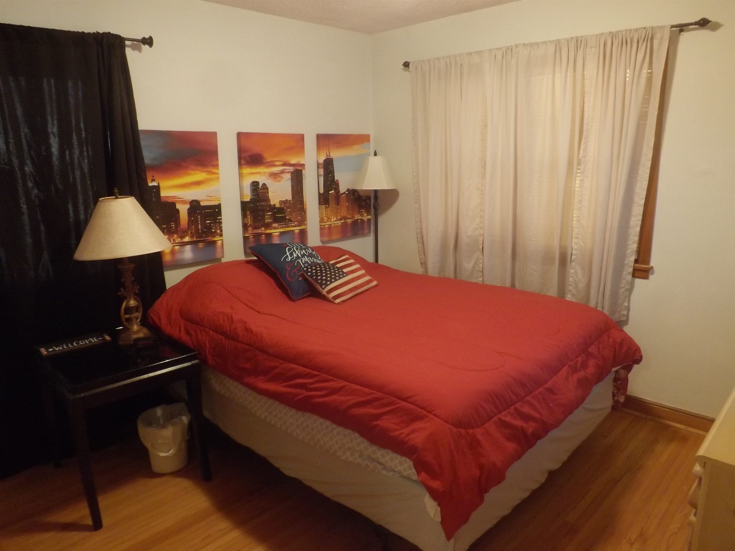 Queen bed with Roku Smart TV