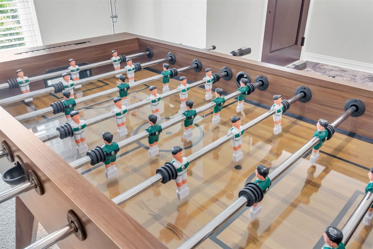 Step into a designer-inspired game room with stylish decor and non stop fun!