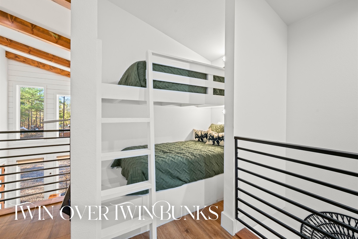 The loft sleeping area provides additional accommodations while still maintaining an open, airy feel.