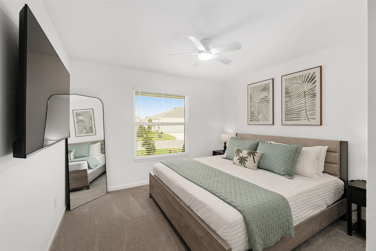 This bright and airy king guest room brings a clean, relaxed feel with soft coastal-inspired touches throughout. A comfortable place to settle in, recharge, and feel right at home during your stay.