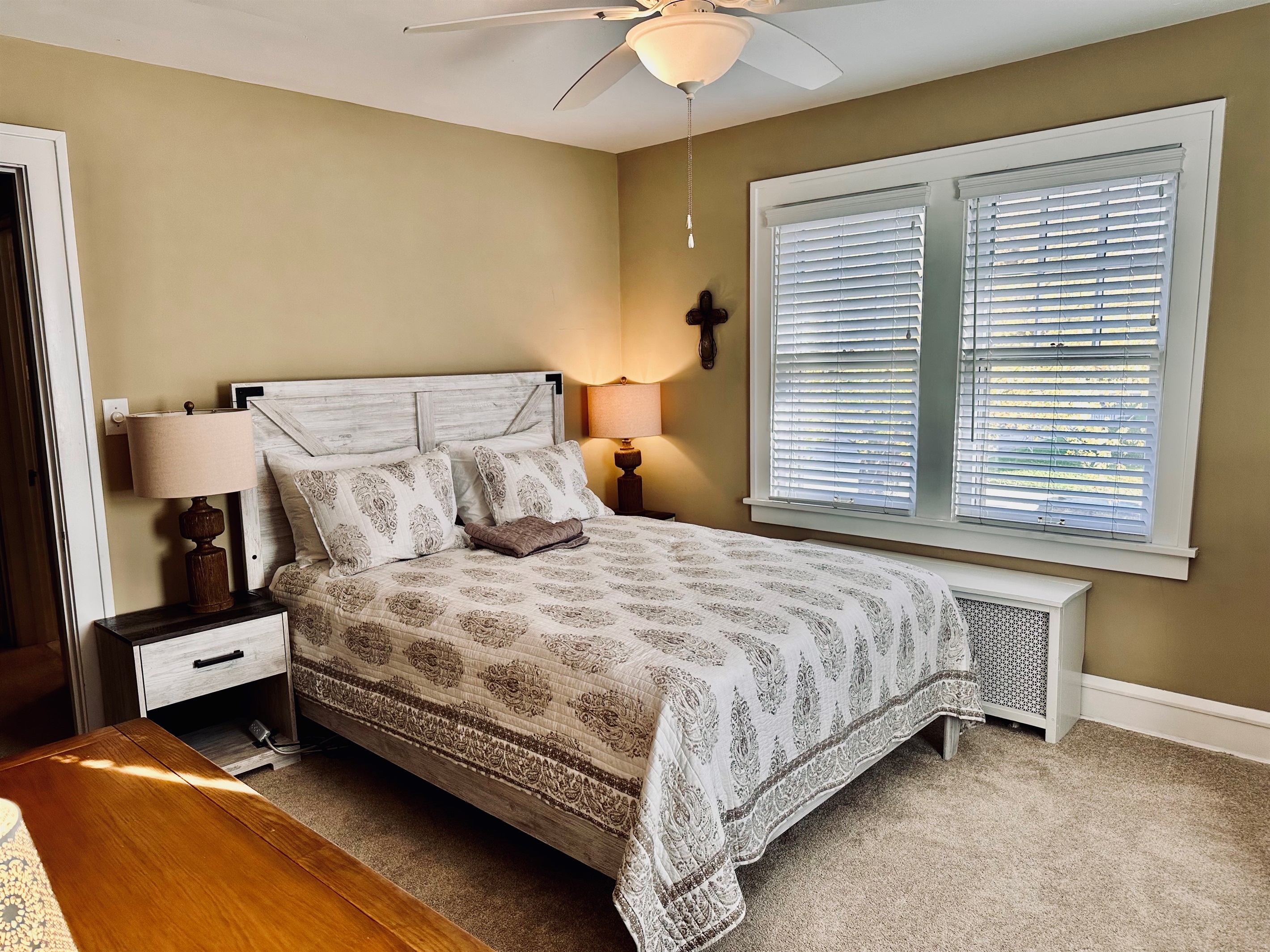 Bedroom #1: Beautifully decorated primary bedroom, with a Serta mattress and low-profile box spring.
