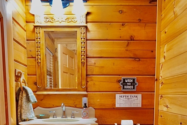 Charming Bathroom: Rustic wood accents and vintage decor elevate your relaxation experience!