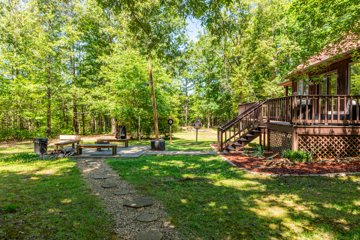 Outdoor Oasis: Expansive yard with fire pit and views—perfect for stargazing and bonfires!