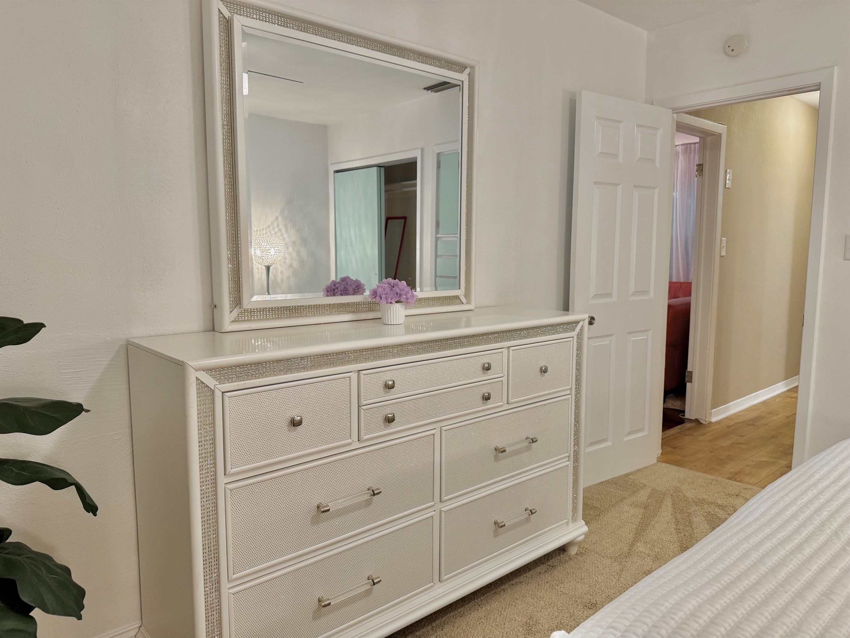 This bedroom offers the perfect balance of chic design and serene comfort—ideal for restful nights after sunny Florida days.