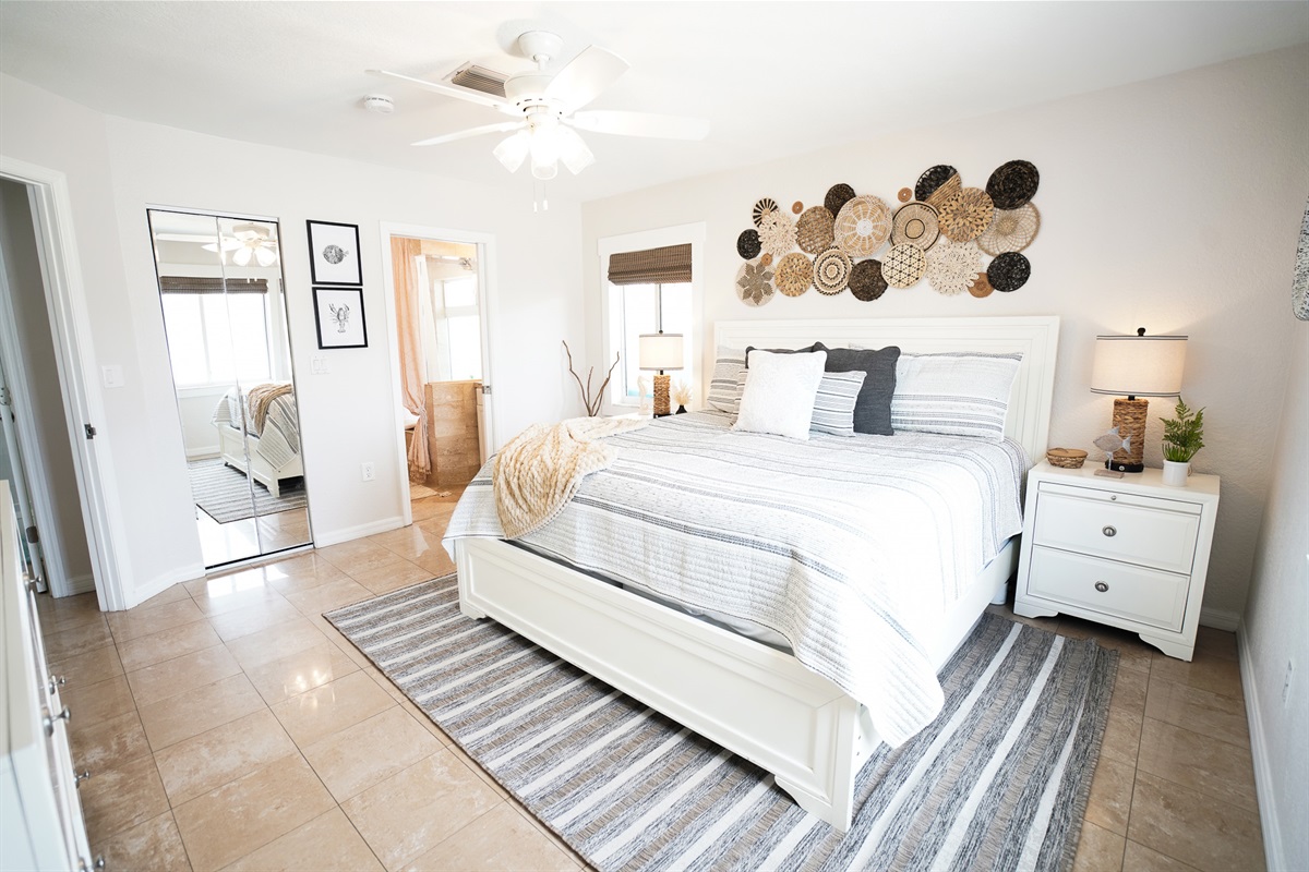 Bedroom 2 offers a peaceful waterview and king bed.