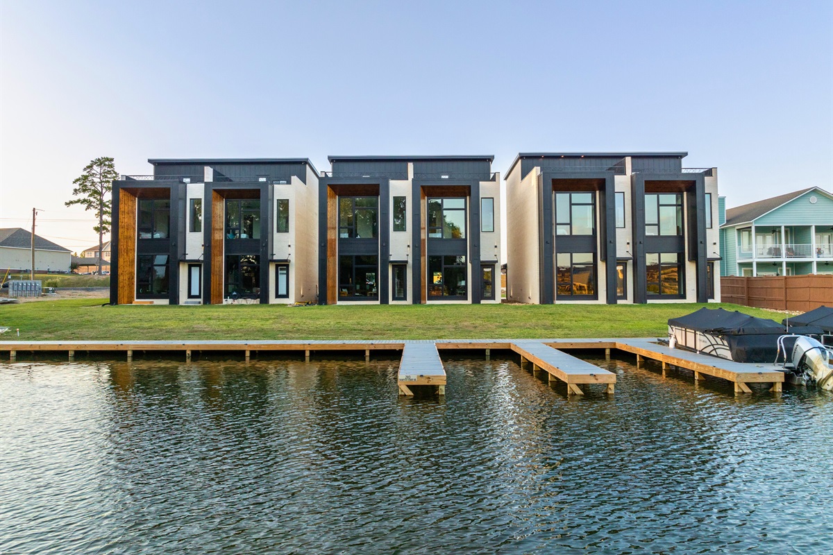 A closer view of the waterfront highlights the property&rsquo;s prime location, with easy dock access and stunning scenery.