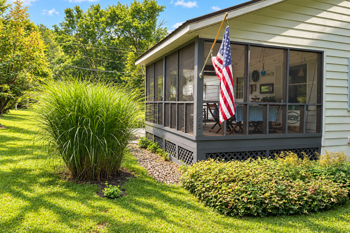 Screened porch overlooking the yard.