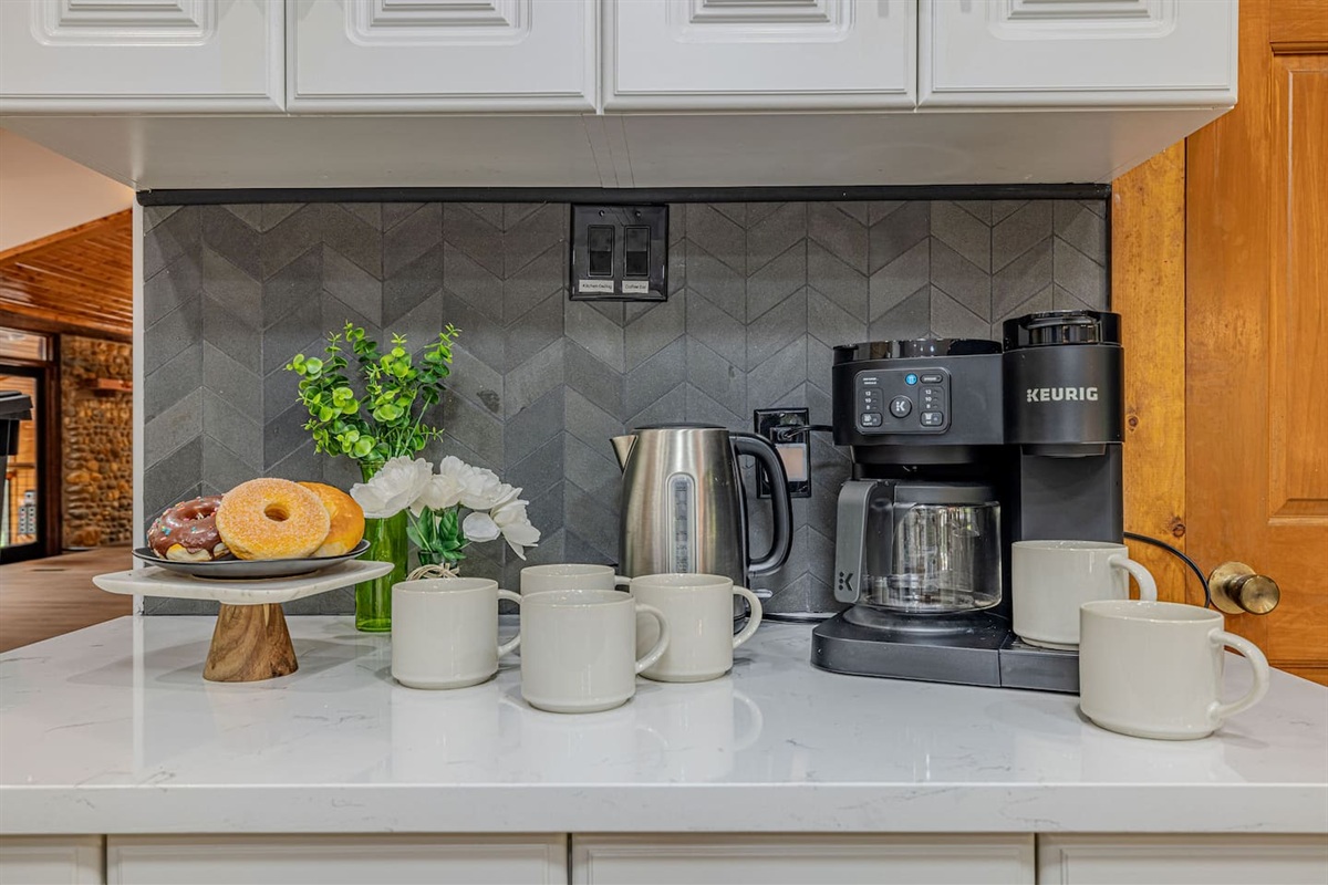Ease into the day with a freshly brewed cup from the Keurig or drip machine, with complimentary coffee pods, tea, sugar, and creamer thoughtfully stocked for your stay.
