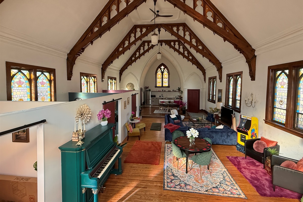 Love those gorgeous wooden, hand carved beams and stained glass windows