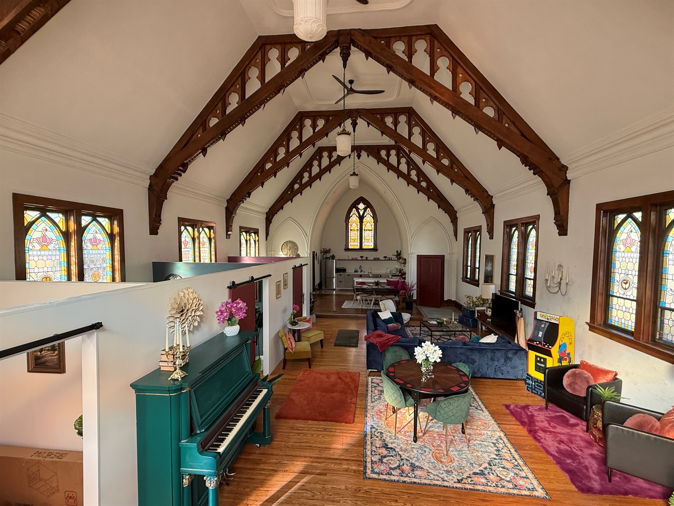 Love those gorgeous wooden, hand carved beams and stained glass windows