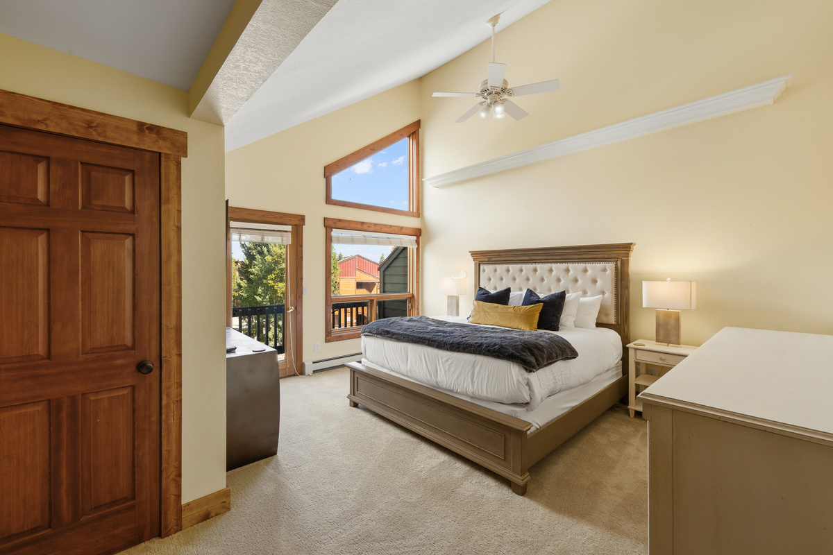 Large Primary King bedroom with its own private balcony, large walk-in closet, and attached full bathroom. 