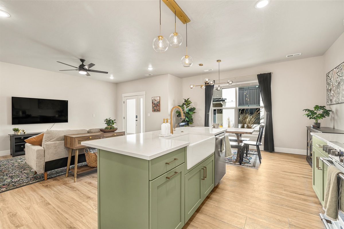 Kitchen, dining area and living room.