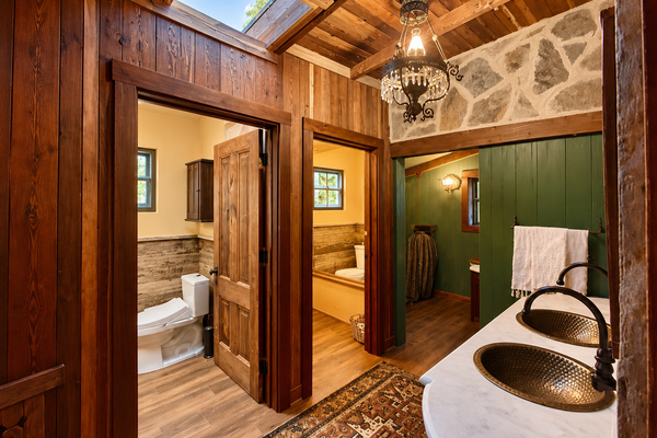 One of Heritage House’s secret superpowers for groups and approved events: two first-floor powder rooms with a gorgeous double vanity, easily accessible from the kitchen and covered outdoor spaces.  
