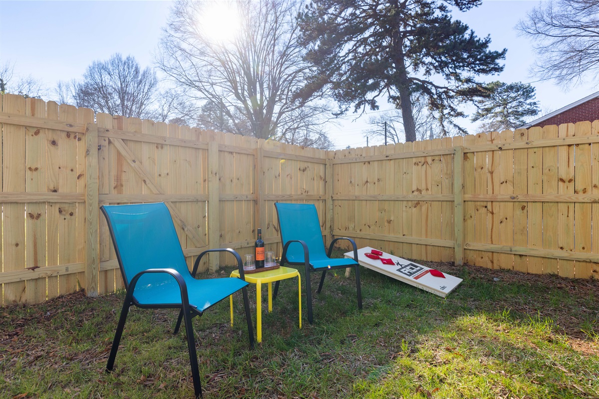 Enjoy the sunny skies and Charlotte's amazing weather in our private backyard. Take in the sun, sip a drink, and play a game of cornhole!
