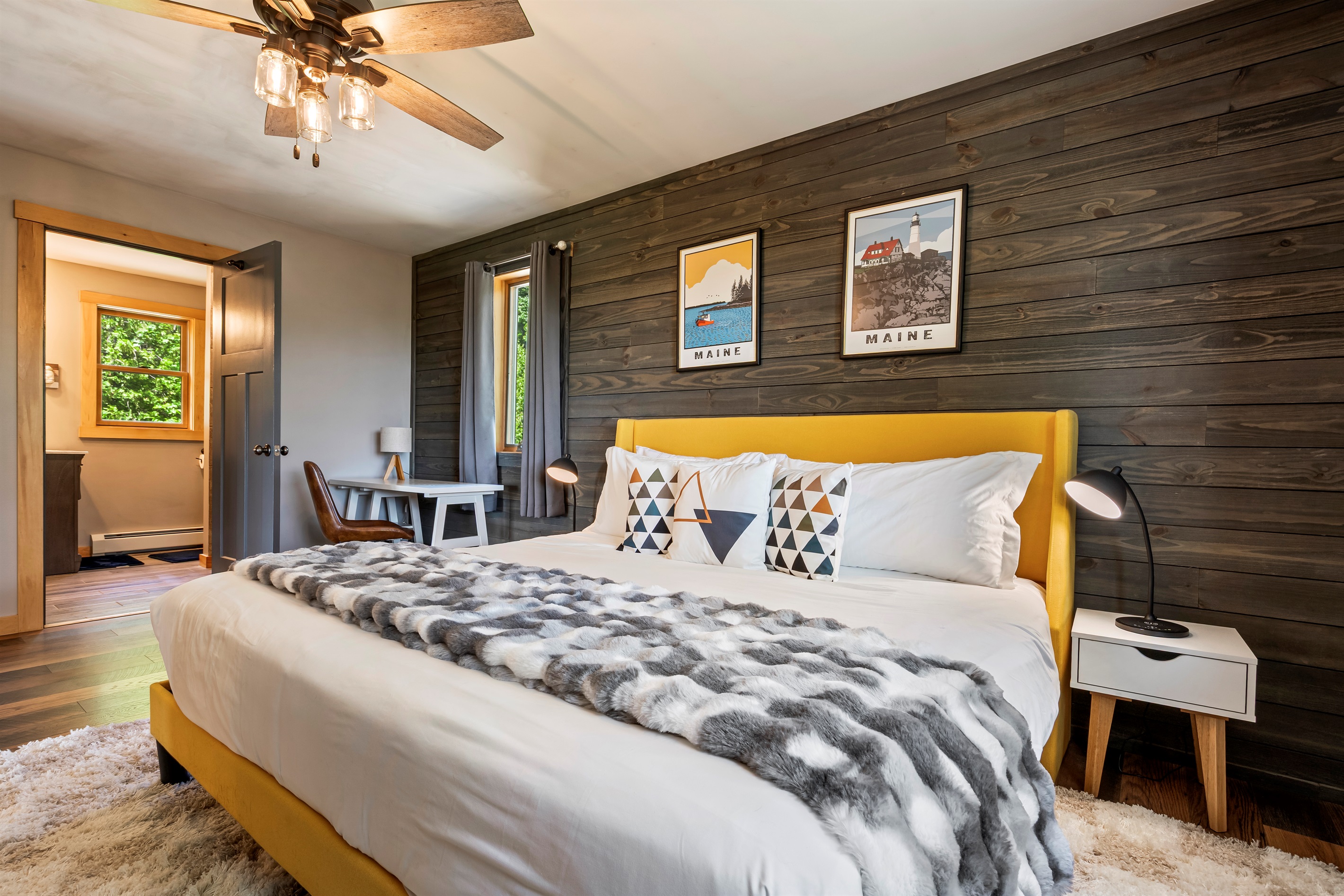 Spacious upstairs master suite with king bed, Smart TV, and private ensuite.
