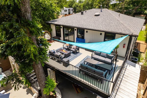 Enjoy warm evenings by the fire pit on this spacious deck retreat!