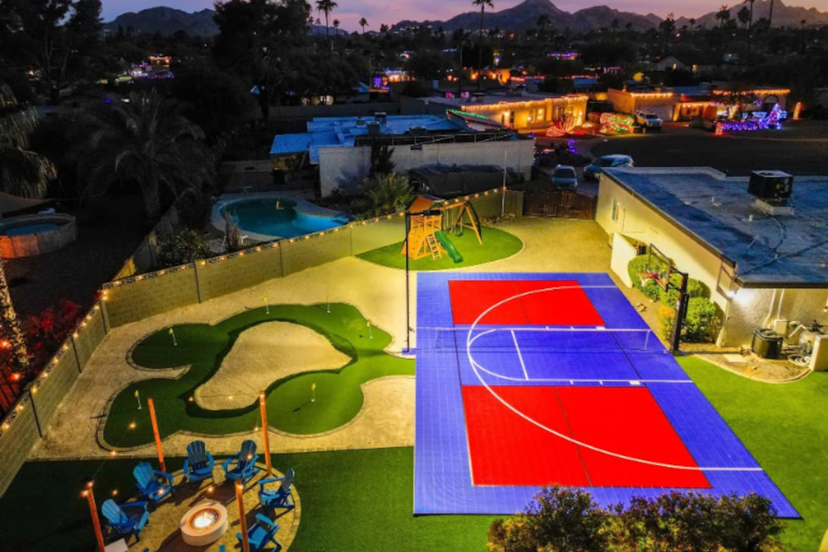 Putting green on one side, sport court on the other — bring your clubs or your basketball, either way you're covered.